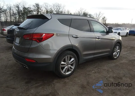 2014 Hyundai Santa Fe Sport 2.0L Turbo z USA, uszkodzony, nr VIN 5XYZU3LA9EG205996